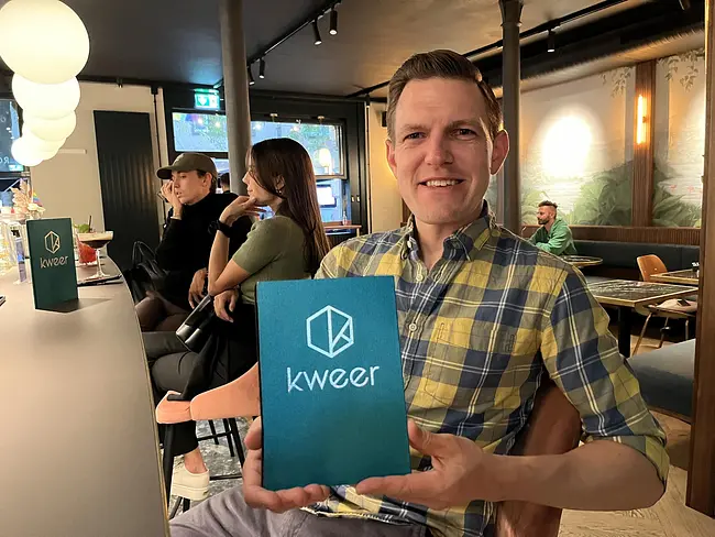 Andy showing off the Kweer menu