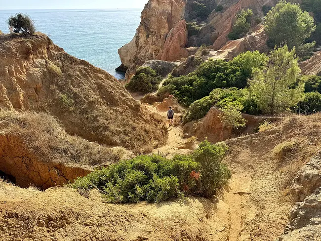 Andy descending to Praia João de Arens