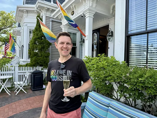 Andy enjoying champagne at Queen Vic Bed & Beverage