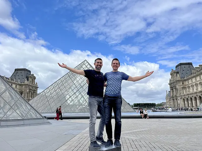 Trai & Andy in front of the Musée du Louvre in Paris