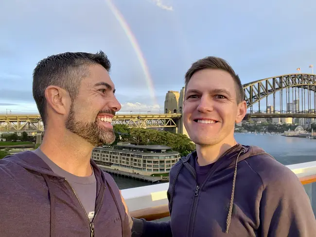 Trai & Andy rainbow Sydney Harbour arrival