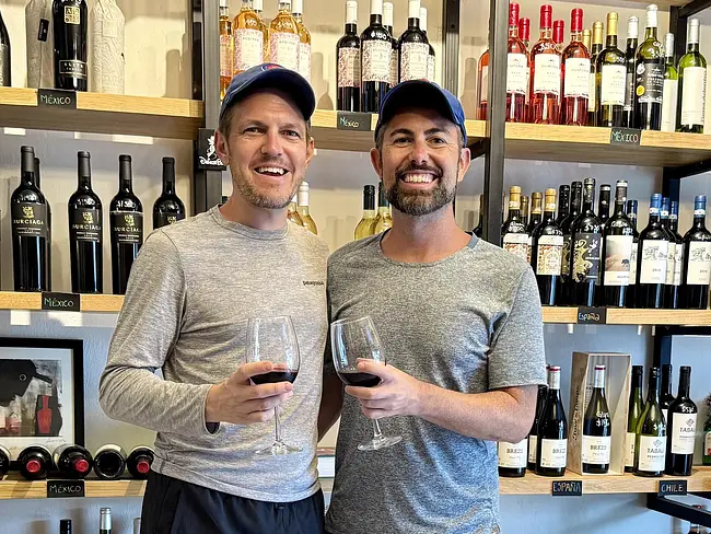 Andy & Trai at Nine Nine Wine Shop in Bacalar