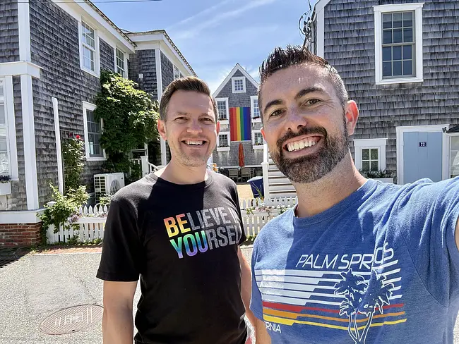 Andy & Trai in Provincetown at the iconic rainbow house