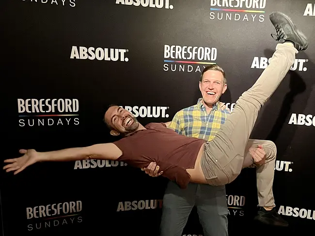 Trai holding Andy at Beresford Sundays