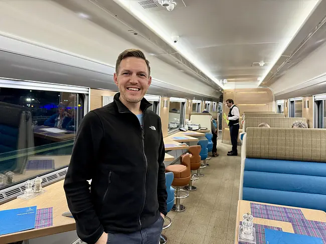 Andy in the Train Club Car aboard the Caledonian Sleeper