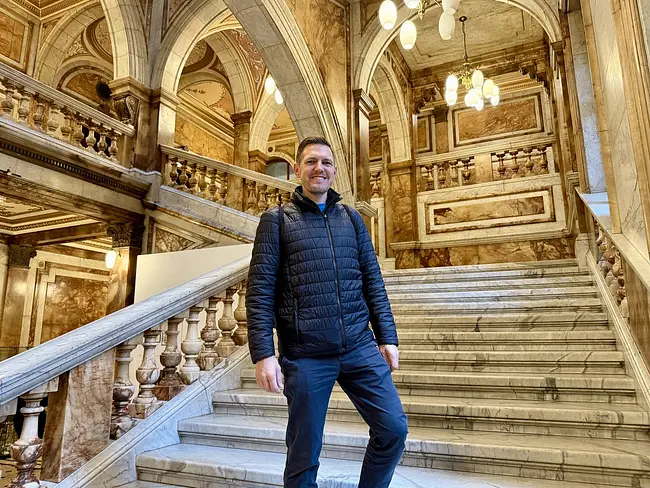 Andy on the marble staircase of Glasgow City Chambers