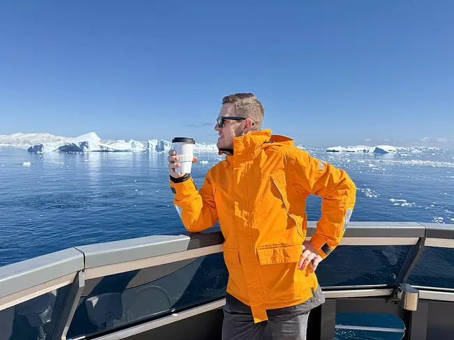 Andy enjoying a coffee in Antarctica aboard the Seabourn Pursuit
