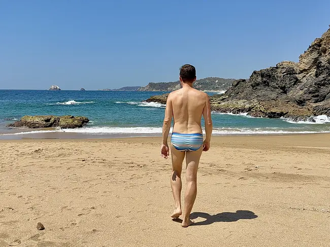 Andy walking into the water at Playa del Amor