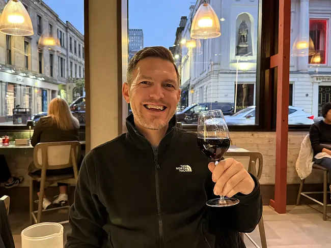 Andy enjoying a wine at Malocchio