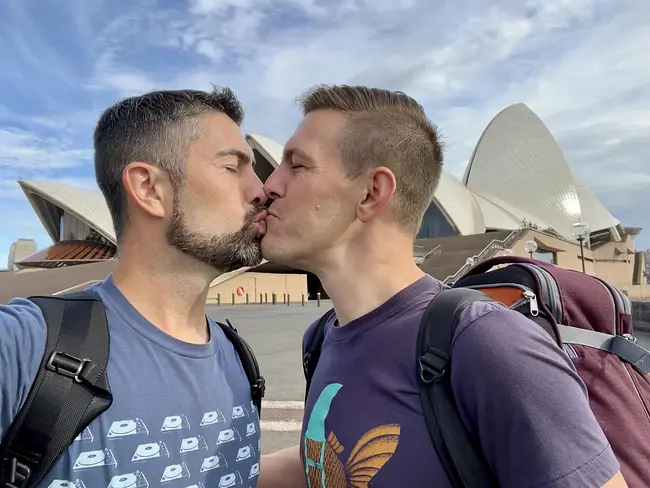 Trai & Andy kissing in front of the Sydney Opera House