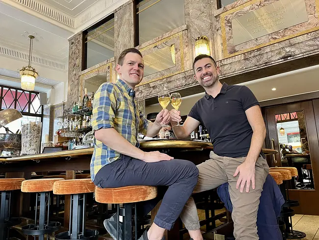 Andy & Trai cheersing at Odeon Café & Bar