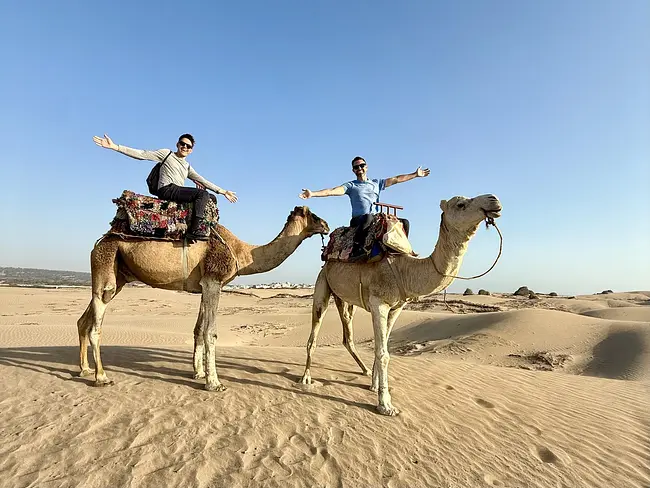 Andy & Trai on a Sunset Camel Ride